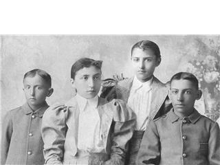 Grandchildren of Magloire Robideau (7E3b4g4). This is a photo of the children of Isabel Elizabeth Robideau (8E3b4g4c) and her husband William McIntosh - William Oliver, Almira Ruth, Laura Belle and John Emery. The children are all part Sioux through their