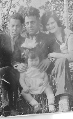 Leo Robidoux, with his father Charles Emile, and his sister Aldea Robdioux and her daughter Olivette. 

Photo courtesy of cousin Michel Jasmin.