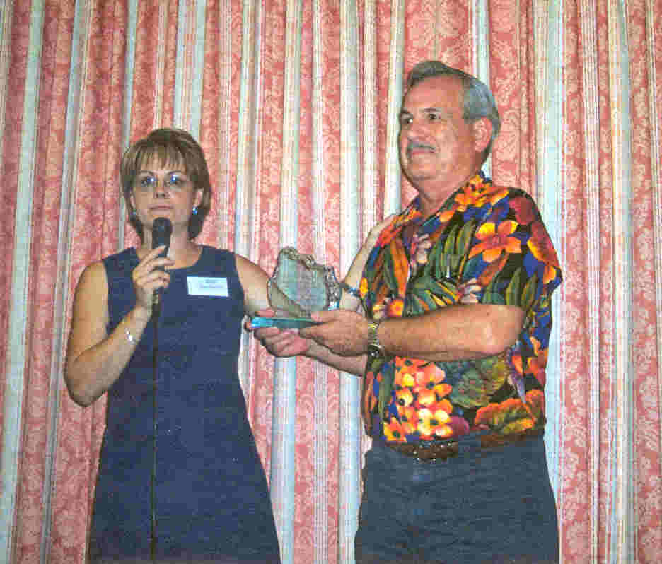 Here I am presenting Clyde with an award for all his hard work and dedication on the family, Montreal, 2003. 
