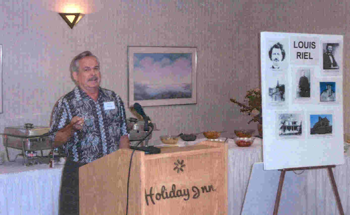 Clyde making a presentation on Louis Riel and his involvement with the family, Montreal, 2003.